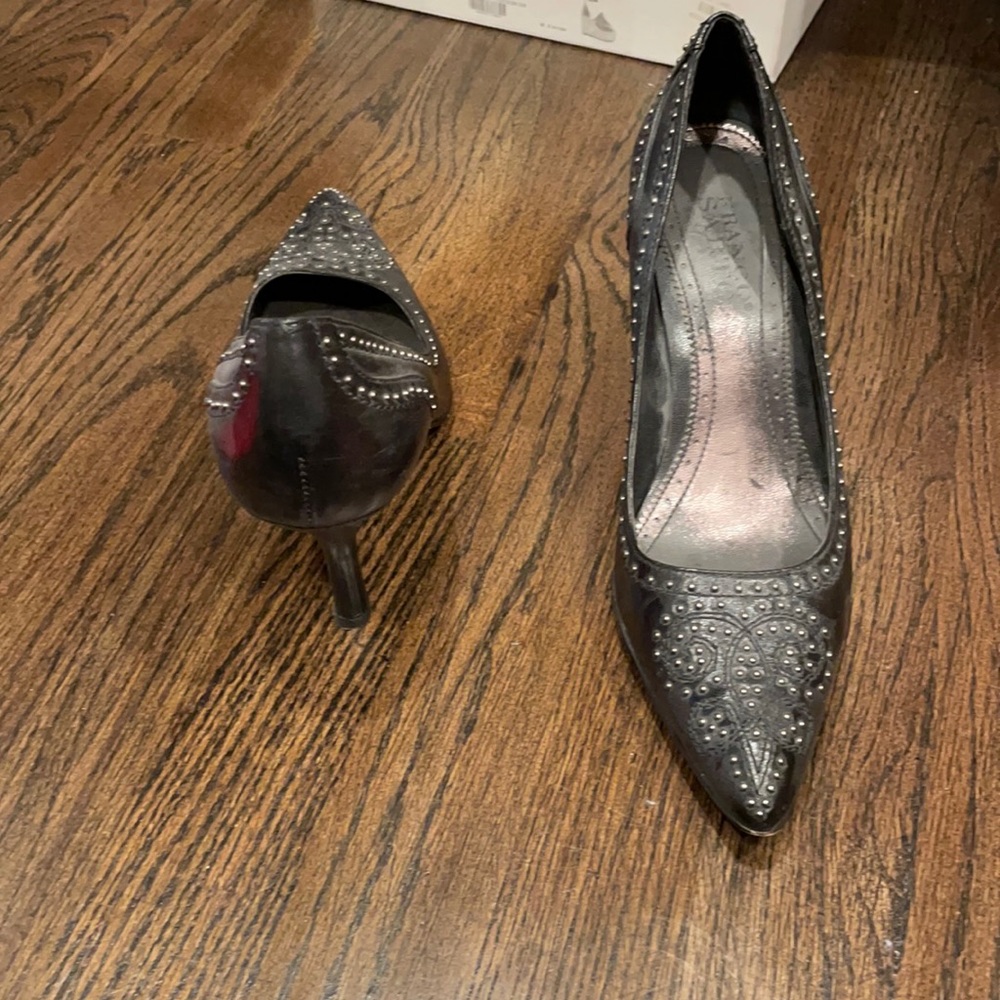 Black studded pointy pumps